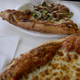 Illustration for article titled Costco pizza owes its deliciousness to a robot